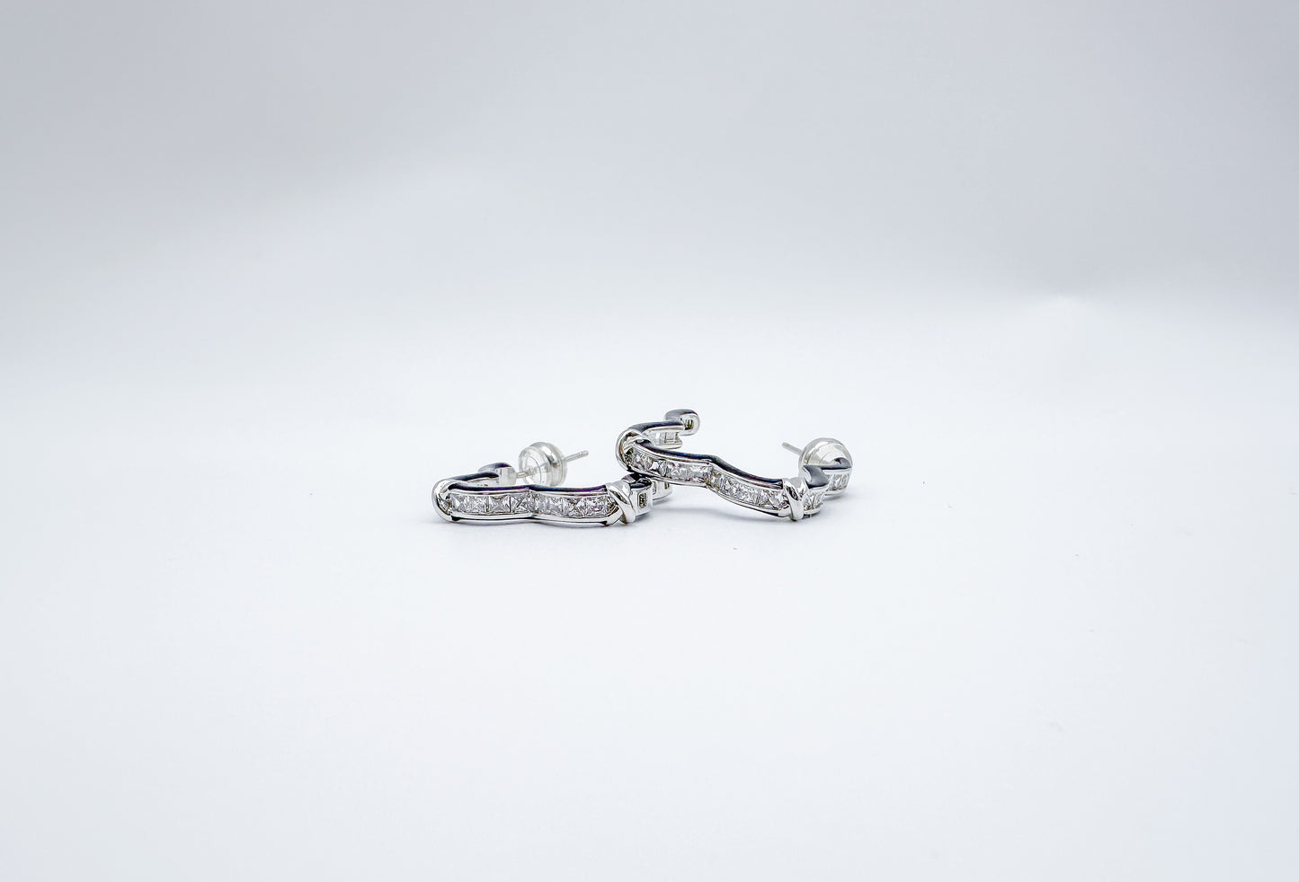 Elegant Black Earrings Featuring a Zircon Floral Trim