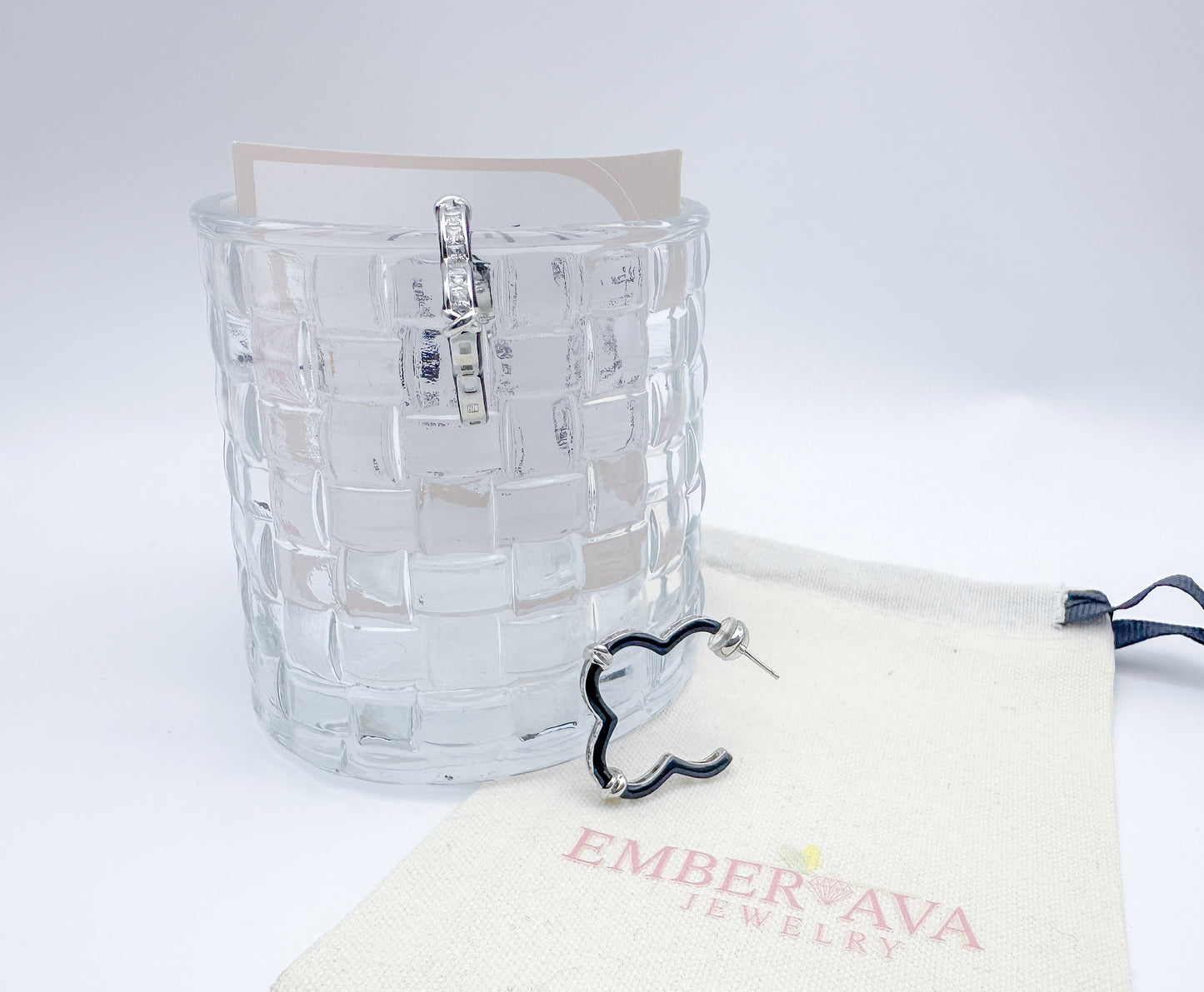 Elegant Black Earrings Featuring a Zircon Floral Trim