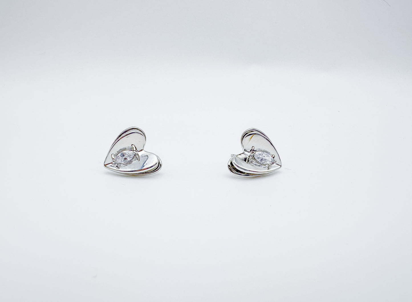 Folded Heart-Shaped Stud Earrings with Zircon Inlay